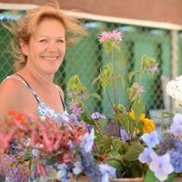 Volunteer arranging flowers